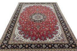 Surface texture of 2000s Tabriz 50/60/70 Raj rug with natural Cork and intricate pattern