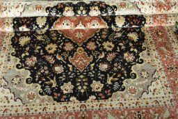 Close-up detail of 2000s Tabriz 50/60/70 Raj rug from Iran / Persia showing Cork weave