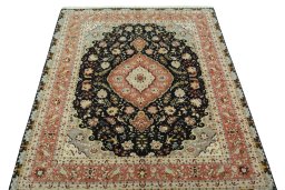 Surface texture of 2000s Tabriz 50/60/70 Raj rug with natural Cork and intricate pattern