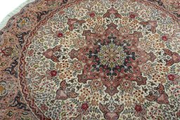 Backside of handmade New Tabriz 50/60/70 Raj rug showing knot structure and weave density