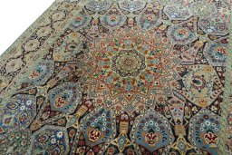 Backside of handmade New Tabriz 50/60/70 Raj rug showing knot structure and weave density