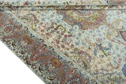 Close-up detail of 2000s Tabriz 50/60/70 Raj rug from Iran / Persia showing Cork weave