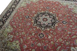 Backside of handmade 2000s Tabriz 50/60/70 Raj rug showing knot structure and weave density