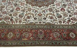 Close-up detail of 2000s Tabriz 50/60/70 Raj rug from Iran / Persia showing Cork weave