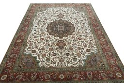Surface texture of 2000s Tabriz 50/60/70 Raj rug with natural Cork and intricate pattern