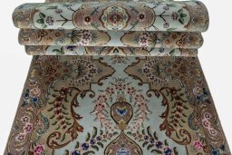 Corner detail of 2000s Tabriz 50/60/70 Raj rug showing border pattern and Cork pile