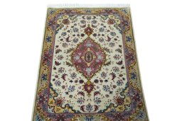 Surface texture of 2000s Tabriz 50/60/70 Raj rug with natural Cork and intricate pattern