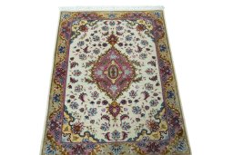 Surface texture of 2000s Tabriz 50/60/70 Raj rug with natural Cork and intricate pattern
