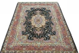 Surface texture of 2000s Tabriz 50/60/70 Raj rug with natural Cork and intricate pattern