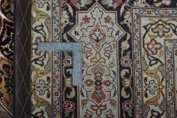 Backside of handmade New Tabriz 50/60/70 Raj rug showing knot structure and weave density