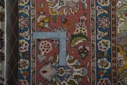 Backside of handmade New Tabriz 50/60/70 Raj rug showing knot structure and weave density