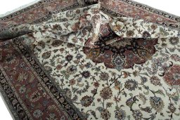 Surface texture of New Tabriz 50/60/70 Raj rug with natural Cork and intricate pattern