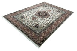 Corner detail of New Tabriz 50/60/70 Raj rug showing border pattern and Cork pile