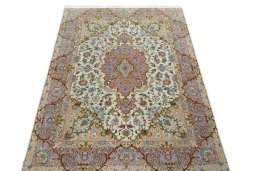 Surface texture of New Tabriz 50/60/70 Raj rug with natural Cork and intricate pattern
