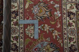 Backside of handmade New Tabriz 50/60/70 Raj rug showing knot structure and weave density