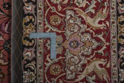 Backside of handmade New Tabriz 50/60/70 Raj rug showing knot structure and weave density