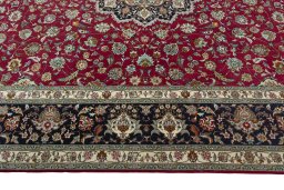 Corner detail of New Tabriz 50/60/70 Raj rug showing border pattern and Cork pile