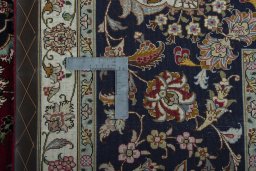 Backside of handmade New Tabriz 50/60/70 Raj rug showing knot structure and weave density