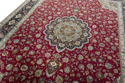 Backside of handmade New Tabriz 50/60/70 Raj rug showing knot structure and weave density