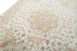Backside of handmade New Tabriz 50/60/70 Raj rug showing knot structure and weave density