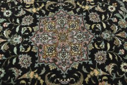 Backside of handmade New Tabriz 50/60/70 Raj rug showing knot structure and weave density