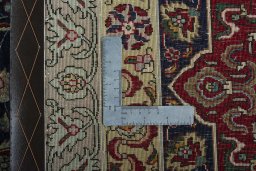Backside of handmade 1950s Tabriz 50/60/70 Raj rug showing knot structure and weave density