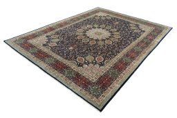 Corner detail of 1950s Tabriz 50/60/70 Raj rug showing border pattern and Cork pile