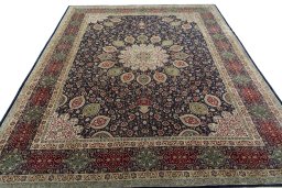 Surface texture of 1950s Tabriz 50/60/70 Raj rug with natural Cork and intricate pattern