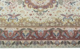 Corner detail of 2000s Tabriz 50/60/70 Raj rug showing border pattern and Cork pile