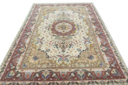 Surface texture of 2000s Tabriz 50/60/70 Raj rug with natural Cork and intricate pattern