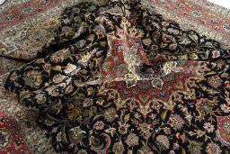Surface texture of New Tabriz 50/60/70 Raj rug with natural Cork and intricate pattern