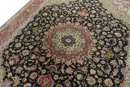 Backside of handmade New Tabriz 50/60/70 Raj rug showing knot structure and weave density