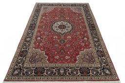 Surface texture of 2000s Tabriz 50/60/70 Raj rug with natural Cork and intricate pattern