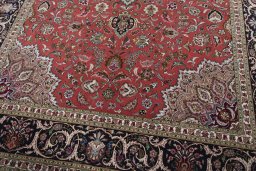 Close-up detail of 2000s Tabriz 50/60/70 Raj rug from Iran / Persia showing Cork weave