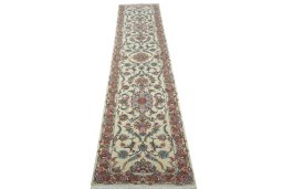 Surface texture of 2000s Tabriz 50/60/70 Raj rug with natural Cork and intricate pattern