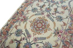 Backside of handmade 2000s Tabriz 50/60/70 Raj rug showing knot structure and weave density