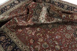 Surface texture of 2000s Tabriz 50/60/70 Raj rug with natural Cork and intricate pattern