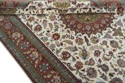 Close-up detail of 2000s Tabriz 50/60/70 Raj rug from Iran / Persia showing Cork weave