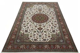 Surface texture of 2000s Tabriz 50/60/70 Raj rug with natural Cork and intricate pattern