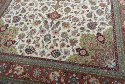 Close-up detail of 2000s Tabriz 50/60/70 Raj rug from Iran / Persia showing Cork weave
