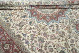 Close-up detail of 2000s Tabriz 50/60/70 Raj rug from Iran / Persia showing Cork weave