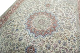 Backside of handmade 2000s Tabriz 50/60/70 Raj rug showing knot structure and weave density