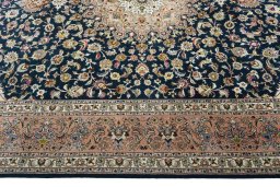 Corner detail of New Tabriz 50/60/70 Raj rug showing border pattern and Cork pile