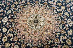 Central medallion detail of New Tabriz 50/60/70 Raj rug from Iran / Persia