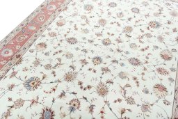 Backside of handmade New Tabriz 50/60/70 Raj rug showing knot structure and weave density