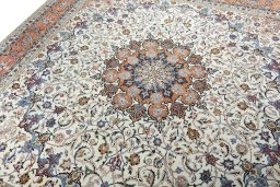 Backside of handmade New Tabriz 50/60/70 Raj rug showing knot structure and weave density