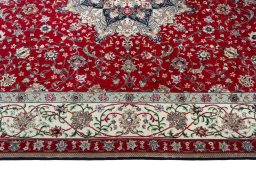Corner detail of New Tabriz 50/60/70 Raj rug showing border pattern and Cork pile
