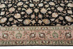 Corner detail of New Tabriz 50/60/70 Raj rug showing border pattern and Cork pile