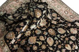 Surface texture of New Tabriz 50/60/70 Raj rug with natural Cork and intricate pattern