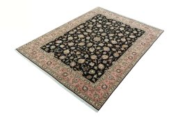 Corner detail of New Tabriz 50/60/70 Raj rug showing border pattern and Cork pile